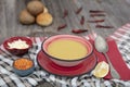 Mercimek corbasi, red lentil soup, turkish cuisine.  bowl of soup, parsley and croutons on wooden table Royalty Free Stock Photo