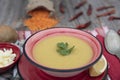 Mercimek corbasi, red lentil soup, turkish cuisine.  bowl of soup, parsley and croutons on wooden table Royalty Free Stock Photo