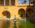 The Mercury Pond with the statue of Mercury in the gardens of the Real Alcazar in Seville, Andalusia, Spain.