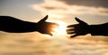 Mercy, two hands silhouette on sky background, connection or help concept. The outstretched hands, salvation, help Royalty Free Stock Photo