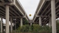 Merge sign between overpasses