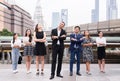 Mergers and acquisition,Successful group of business diversity people,Team success achievement hand cross arms over blurred buildi Royalty Free Stock Photo