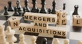 Mergers and Acquisitions strategy on a chess board Royalty Free Stock Photo