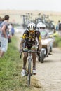 Merhawi Kudus Ghebremedhin Riding on a Cobblestone Road - Tour d