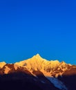 Meri Snow Mountain sunrise golden view China Royalty Free Stock Photo