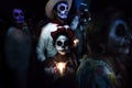 costumed participants of the parade with skull make-up and candles at the parade for dias de los muertos at the Festival Des Las A Royalty Free Stock Photo