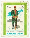 MERIDA, EXTREMADURA, SPAIN. DIC, 01, 2.108 - A stamp shows the typical clothes of peolpe of Ajman, city of Emirates Arab United . Royalty Free Stock Photo