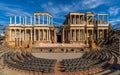 Merida Roman theater from behind with a view of the chairs, granite steps and the stage scaenae frons of classical Roman columns Royalty Free Stock Photo