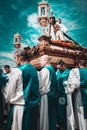 Merida, Spain. April 2019: A group of bearers, called Costaleros, carrying a religious float