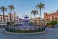 Merida, Spain, May 19, 2021: Sunset over town hall viewed throug