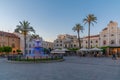 Merida, Spain, May 19, 2021: Sunset over town hall viewed throug