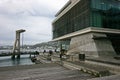 Modern Meridian Energy Building with louvre screen, seafront deck, bridge on water in North Kumutoto, Wellington CBD, New Zealand