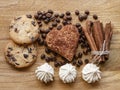 Meringue andcoffee bean and cinnamon cookie cinnamon stick wood texture