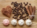 Meringue andcoffee bean and cinnamon cookie cinnamon stick wood texture