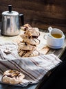 Meringue cake with chocolate, caramel and nuts, dessert, rustic Royalty Free Stock Photo