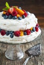 Meringue cake with fresh berries. Royalty Free Stock Photo