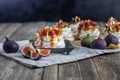 Meringue figs with whipped cream and caremel glaze Royalty Free Stock Photo