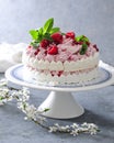 Meringue layer cake with fresh raspberry cream