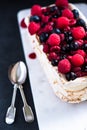 Meringue layers Pavlova with summer fruits