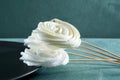 Meringue Marshmallow on dark plate, close-up. Beautiful Zephyr on stick or sweet bouquet. Valentine`s or Mother`s Day. Homemade Royalty Free Stock Photo