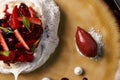 Meringue, Pavlova cake with berries and ice cream Royalty Free Stock Photo