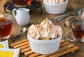 Meringue in portion form on a green concrete background. Pancake recipes, international pancake day Royalty Free Stock Photo