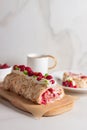 Meringue roll cake with berries whipped cream and Coffe. Summer dessert. Royalty Free Stock Photo