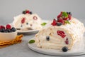 Meringue roll cake with cream and raspberries. Roulade, summer dessert, closeup Royalty Free Stock Photo