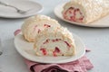 Meringue roll cake with cream, raspberries. Roulade, summer dessert. Confectionery, menu. Close up Royalty Free Stock Photo