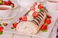 Meringue roll cake Pavlova with cream and strawberry Royalty Free Stock Photo