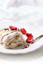 Meringue roulade with cream,strawberries and raspberries Royalty Free Stock Photo