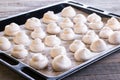 Meringues. Small white meringue sweets on tray Royalty Free Stock Photo