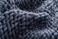 Merino wool handmade knitted large blanket, super chunky yarn, trendy concept. Close-up of knitted blanket, merino wool background Royalty Free Stock Photo