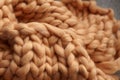 Merino wool handmade knitted large blanket, super chunky yarn, trendy concept. Close-up of knitted blanket, merino wool background Royalty Free Stock Photo