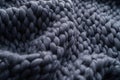 Merino wool handmade knitted large blanket, super chunky yarn, trendy concept. Close-up of knitted blanket, merino wool background Royalty Free Stock Photo