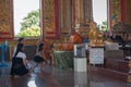 Merit Makers at a Buddhist Temple