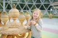 MERKINE, LITHUANIA - AUGUST 16, 2018: Little girl inside Merkine Pyramid, protected by a glass dome, famous for healing and