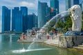 Merlion and Singapore Quay with Skyscrapers Royalty Free Stock Photo