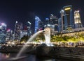 Merlion Statue, the landmark of Singapore with skyscrapers in the background Royalty Free Stock Photo