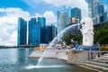 Merlion Statue, The National Symbol Of Singapore And The Tourists Around It.