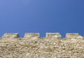 Merlons of an old fortress wall Royalty Free Stock Photo