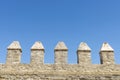 Merlons of an old fortress wall Royalty Free Stock Photo