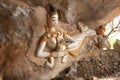 Mermaid feeds her son in the cave in Vang Vieng city, Laos. Royalty Free Stock Photo