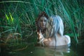 Ritual on a water, mermaid, bride woman in white