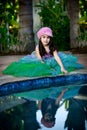 Mermaid by the pool Royalty Free Stock Photo