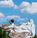 Mermaid sculpture, city sign composition at the entrance to the Yantarny township