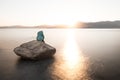 Mermaid sculpture on rock in Ile Rousse Corsica at sunrise Royalty Free Stock Photo