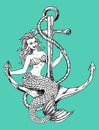 Mermaid sitting on anchor