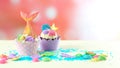 Mermaid theme cupcakes with colorful glitter tails, shells and sea creatures. Royalty Free Stock Photo