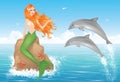 Mermaid and two dolphins.